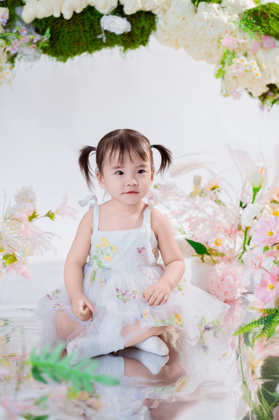 Ngồi ngoan chụp ảnh